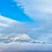 Clouds&snowcappedmountainsfromnearFishTrap,Montana