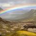 Rainbowovercindercone@southendofVatnaoldurbasalticfissure,Iceland
